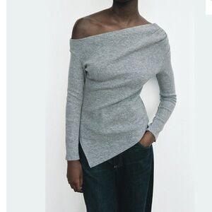 Top with asymmetric neckline